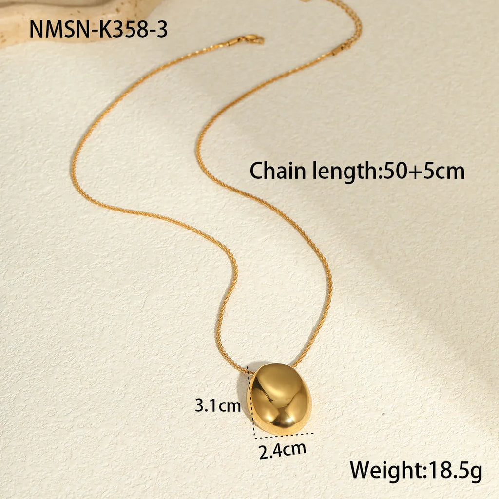 Gold-plated necklace with geometric pendant on stainless steel chain, showing 18K plating and adjustable length