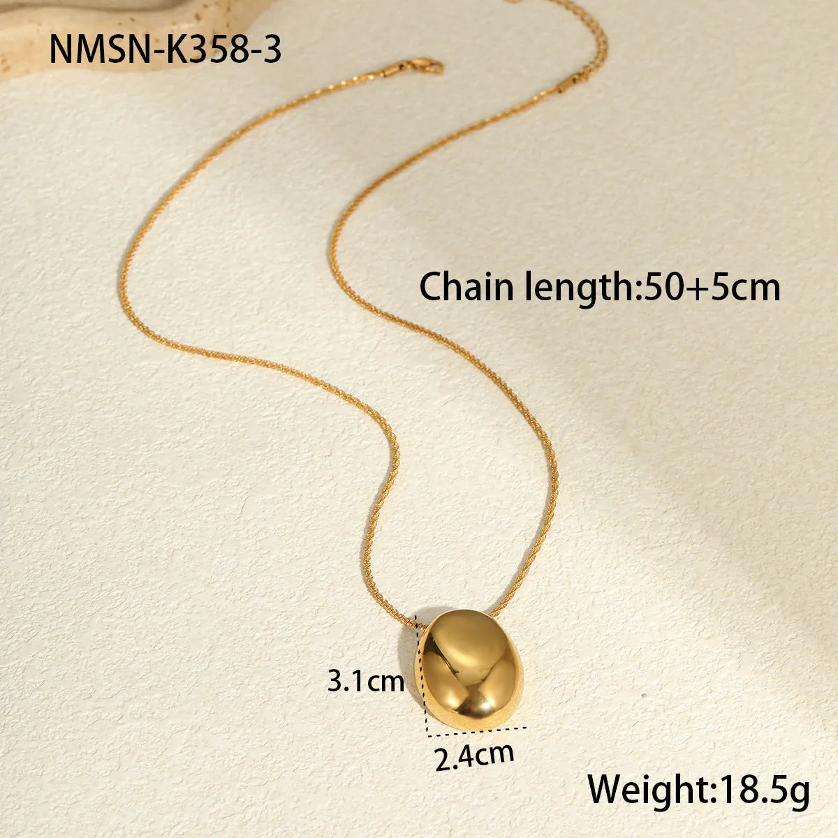 Gold-plated necklace with geometric pendant on stainless steel chain, showing 18K plating and adjustable length