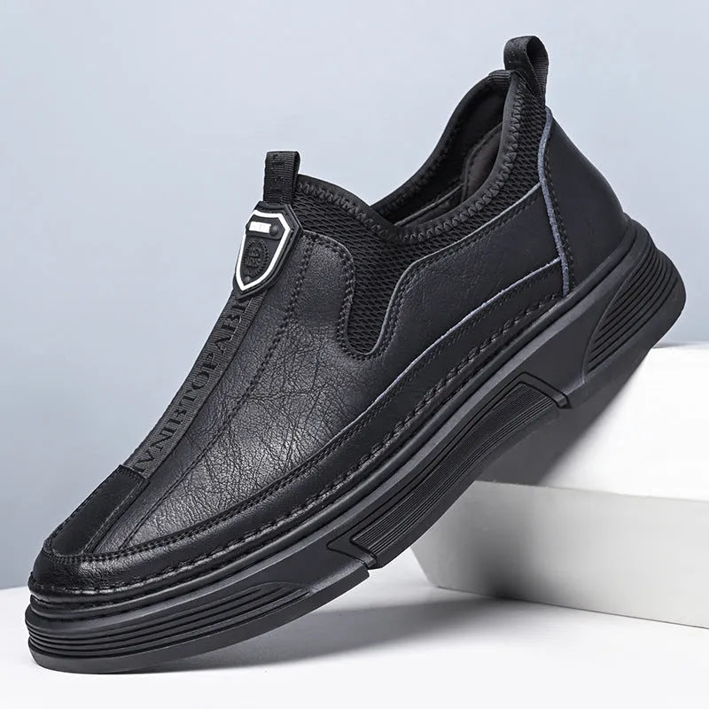 Men's solid colour casual leather shoes with round toe design in black and brown options