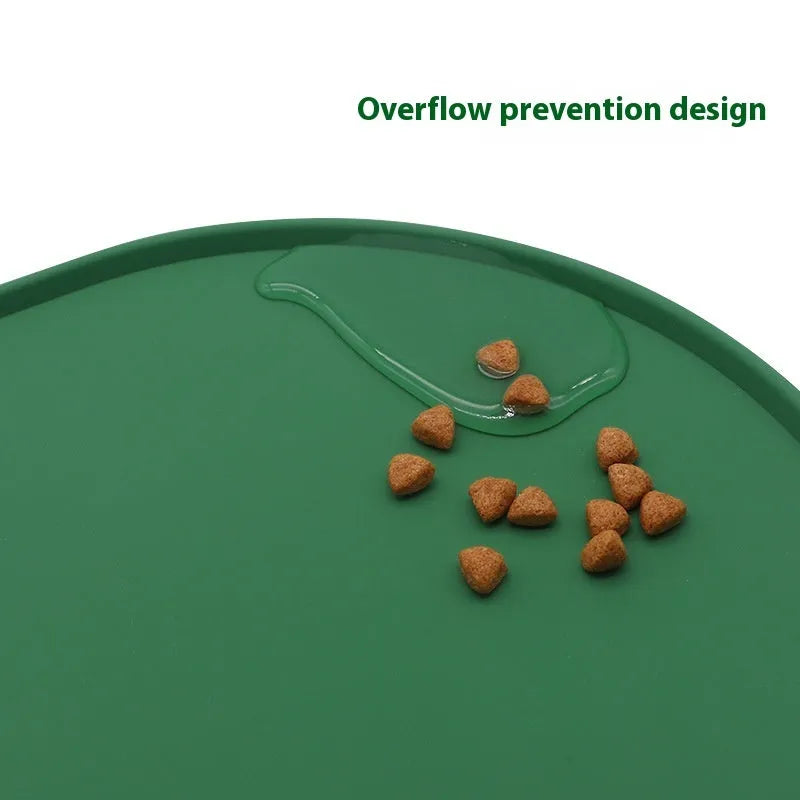 Silicone waterproof cat feeding placemat showing green colour option beneath pet food and water bowls
