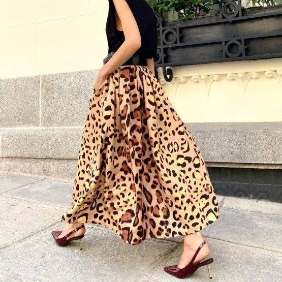 Women's brown leopard print A-line long skirt with big hem design on hanger