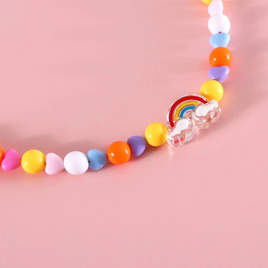 Colourful bead pet necklace for dogs and cats in rainbow, peach, or small flower patterns with adjustable sizing