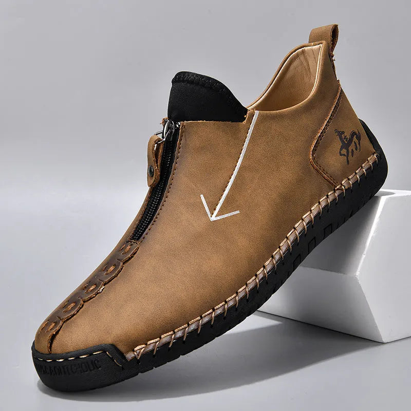 Men's black casual zip-up Martin boots with round toe and low heel on a white background.