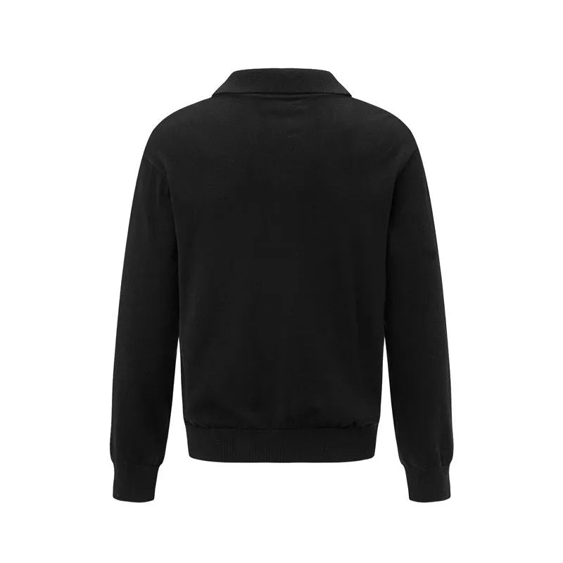 Loose beige acrylic blend pullover sweater on a hanger, showing relaxed fit and texture.