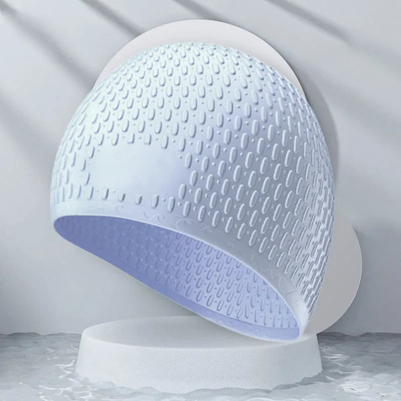 Adult silicone swimming cap in water drop design showing multiple colour options