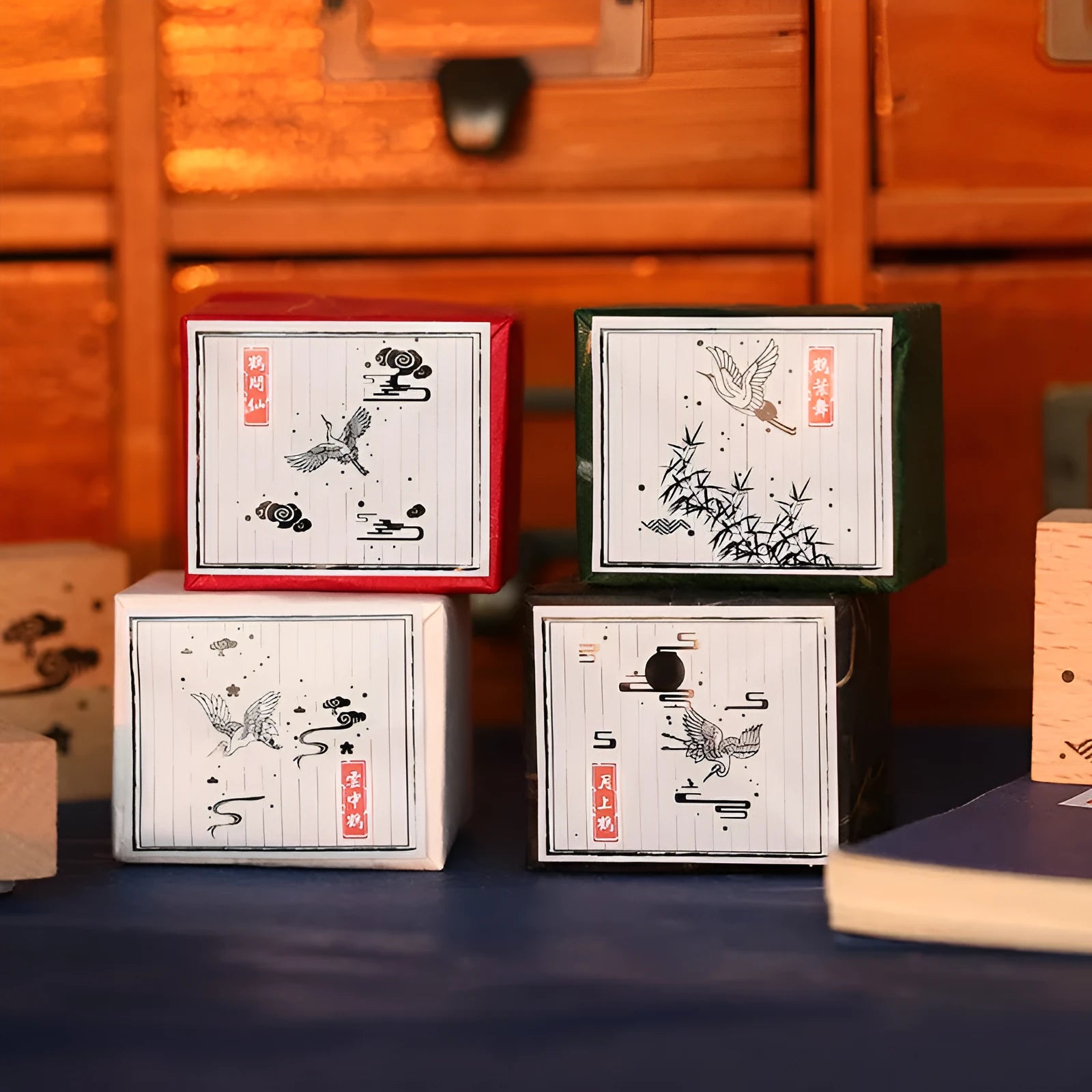Mr. Paper wooden stamp set with four crane designs on a white background