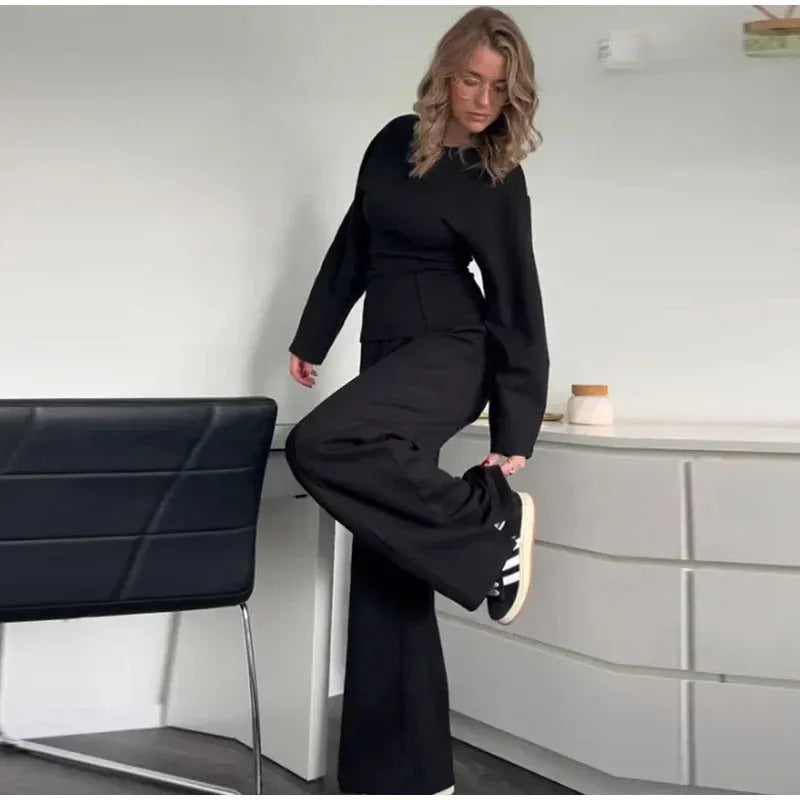 Women's polar fleece two-piece suit set showing O-neck top and wide leg trousers