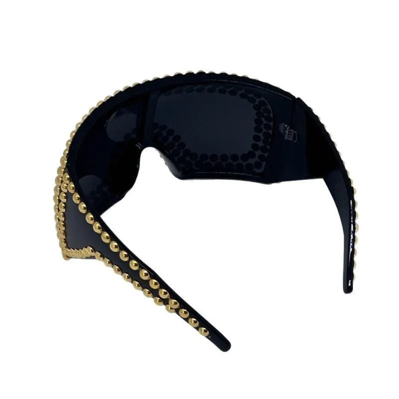 Punk sunglasses with super large square rim frame and rivet details in silver colour