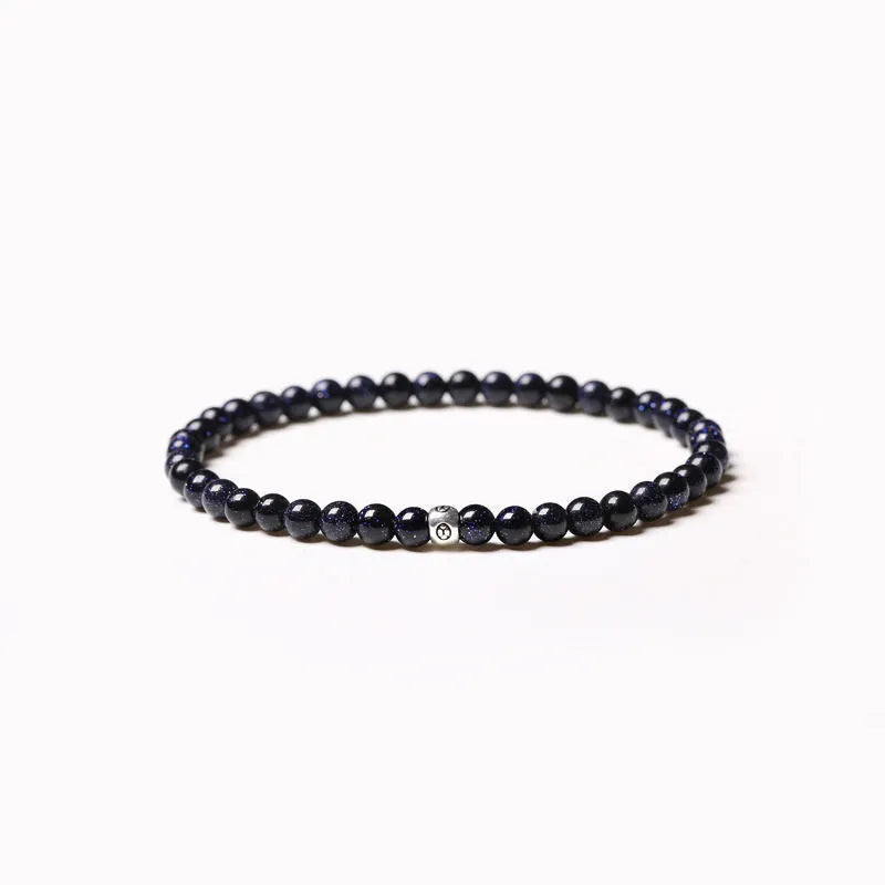 Geometric black agate bracelet with 4mm obsidian and blue San beads and cut surface details