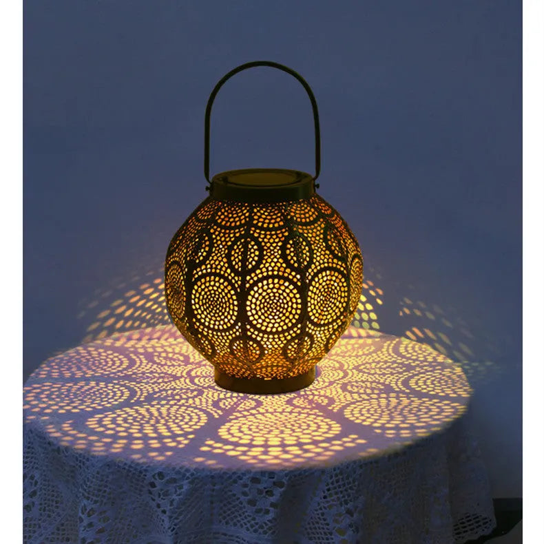 Solar outdoor courtyard hollow decorative iron portable lamp with warm white LED lighting