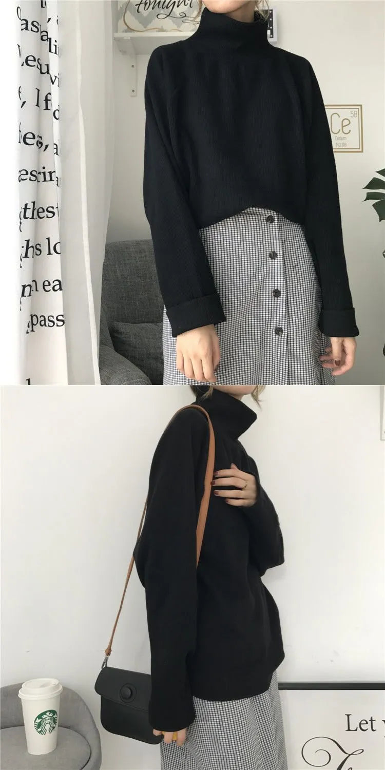 Women's loose-fit long sleeve top with a half-high collar in solid apricot colour, laid flat.