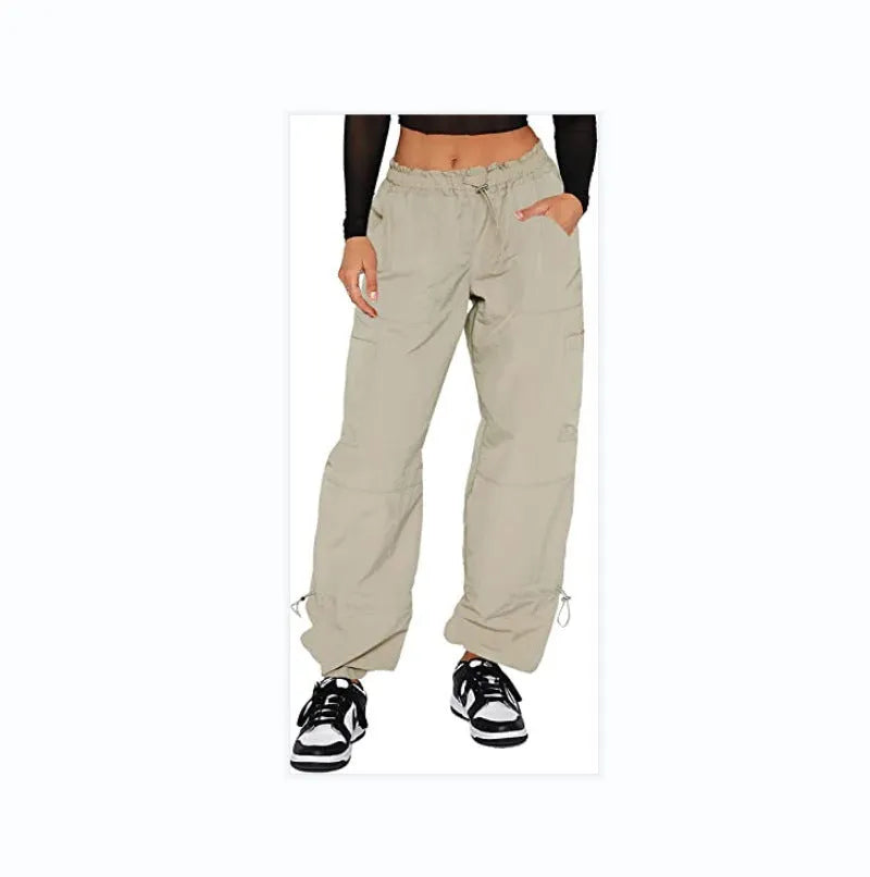 Loose fit straight-leg multi-pocket cargo casual pants in polyester fabric.