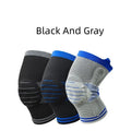 A black and grey cotton knee pad showing a silicone massage spring bar shock absorber on the knee area.