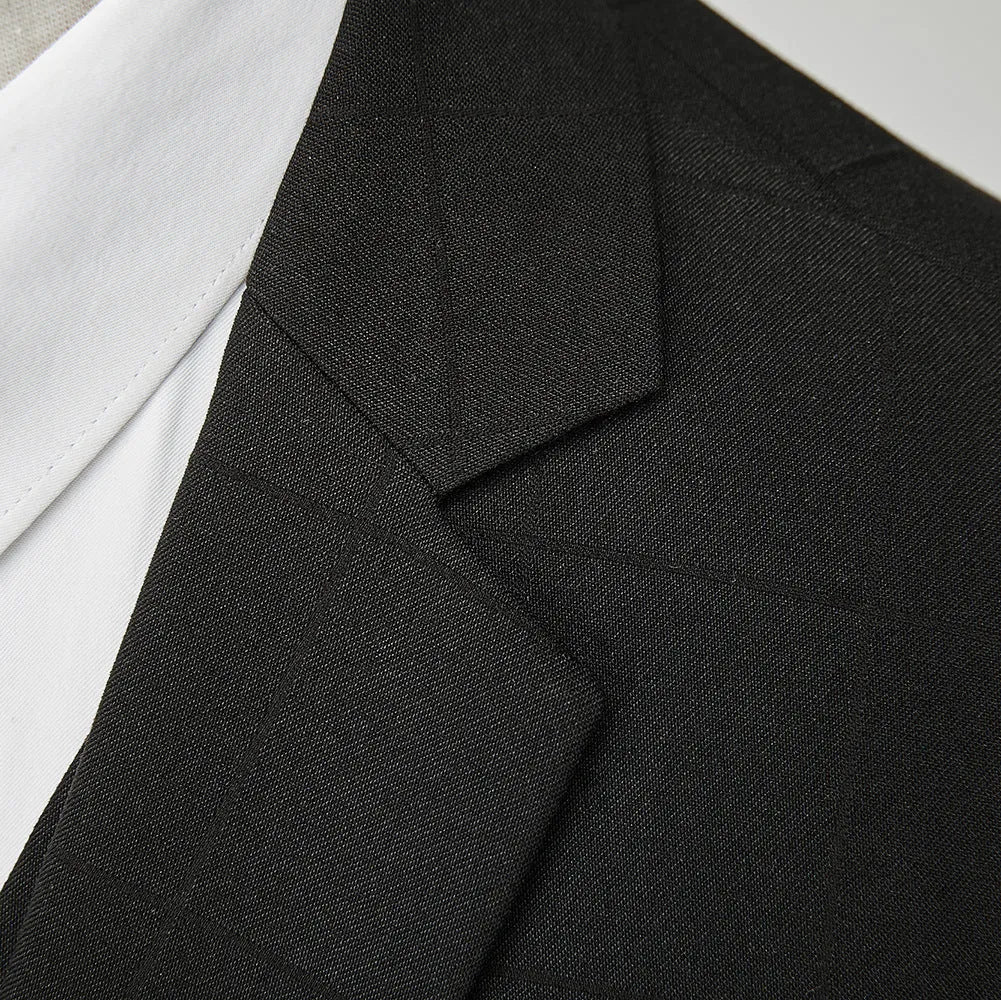 Men's navy blue three-piece plaid suit with slim fit design on hanger