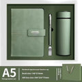 Customisable A5 notebook with imitation leather cover shown in multiple colour options.