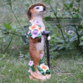 Plastic resin mongoose ornaments with straw hats for garden decoration in yellow brown colour