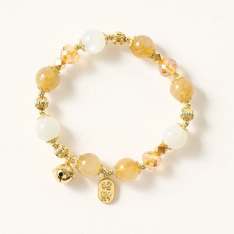 Gold electroplated rutilated quartz bracelet with ringing bell design in Korean style