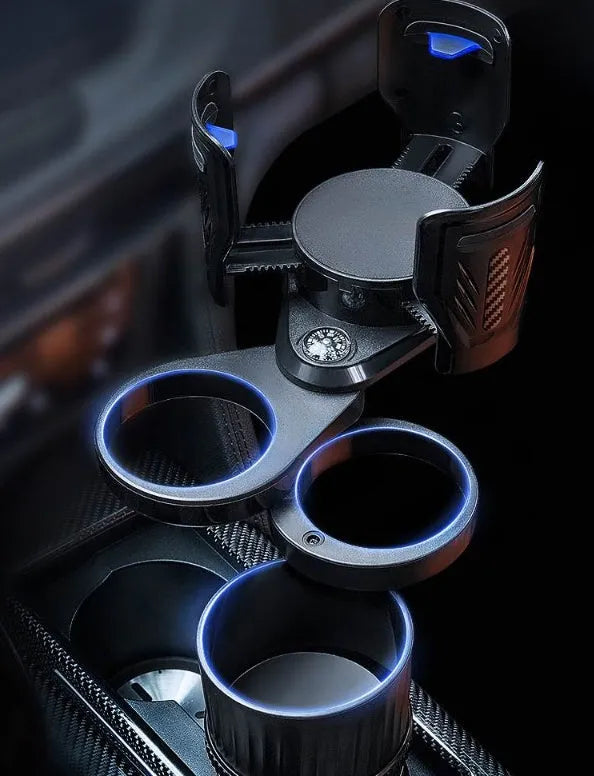 Black retractable car water cup holder with adjustable base on a car centre console.