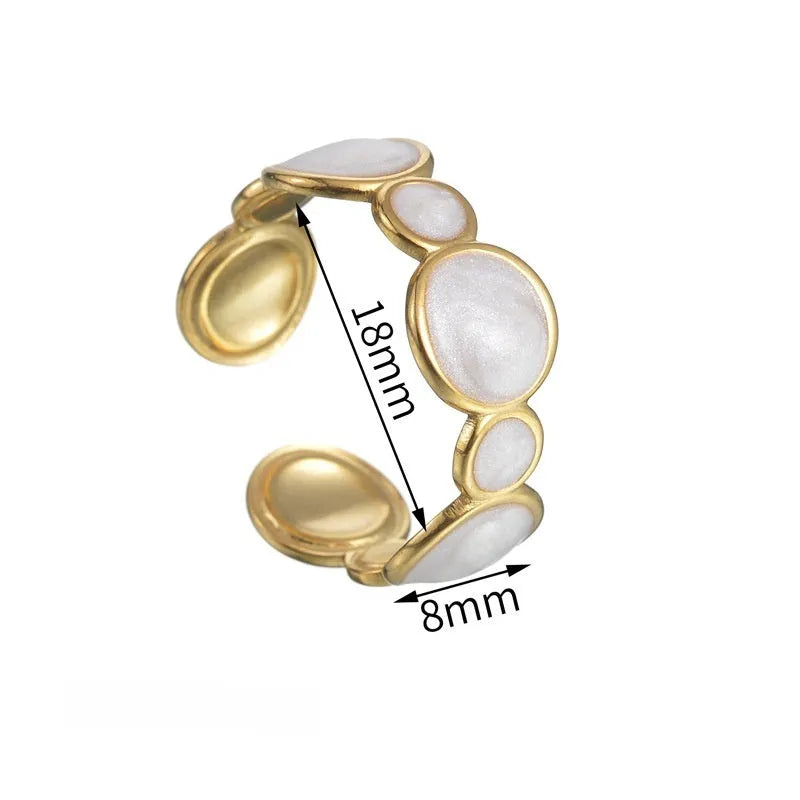 Silver geometric ring with adjustable opening on stainless steel background