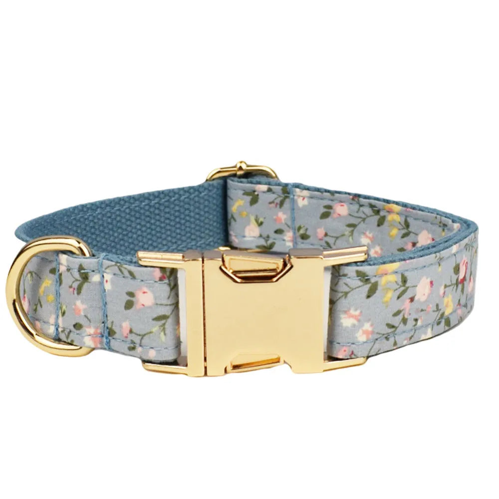 Floral pattern dog collar set with leash, vest, bow tie, and poop bag accessories in multiple sizes