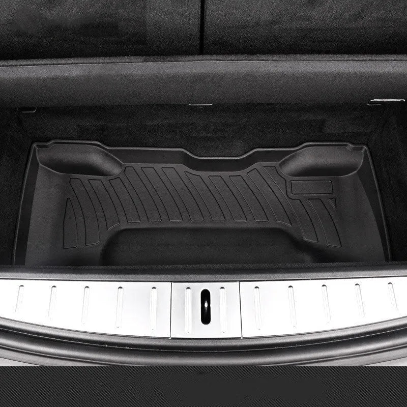Set of black rubber floor mats for a Tesla car interior