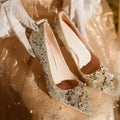 Champagne Xiuhe wedding shoes with rhinestones, pointed toe, fine heel, and one foot kick closure.
