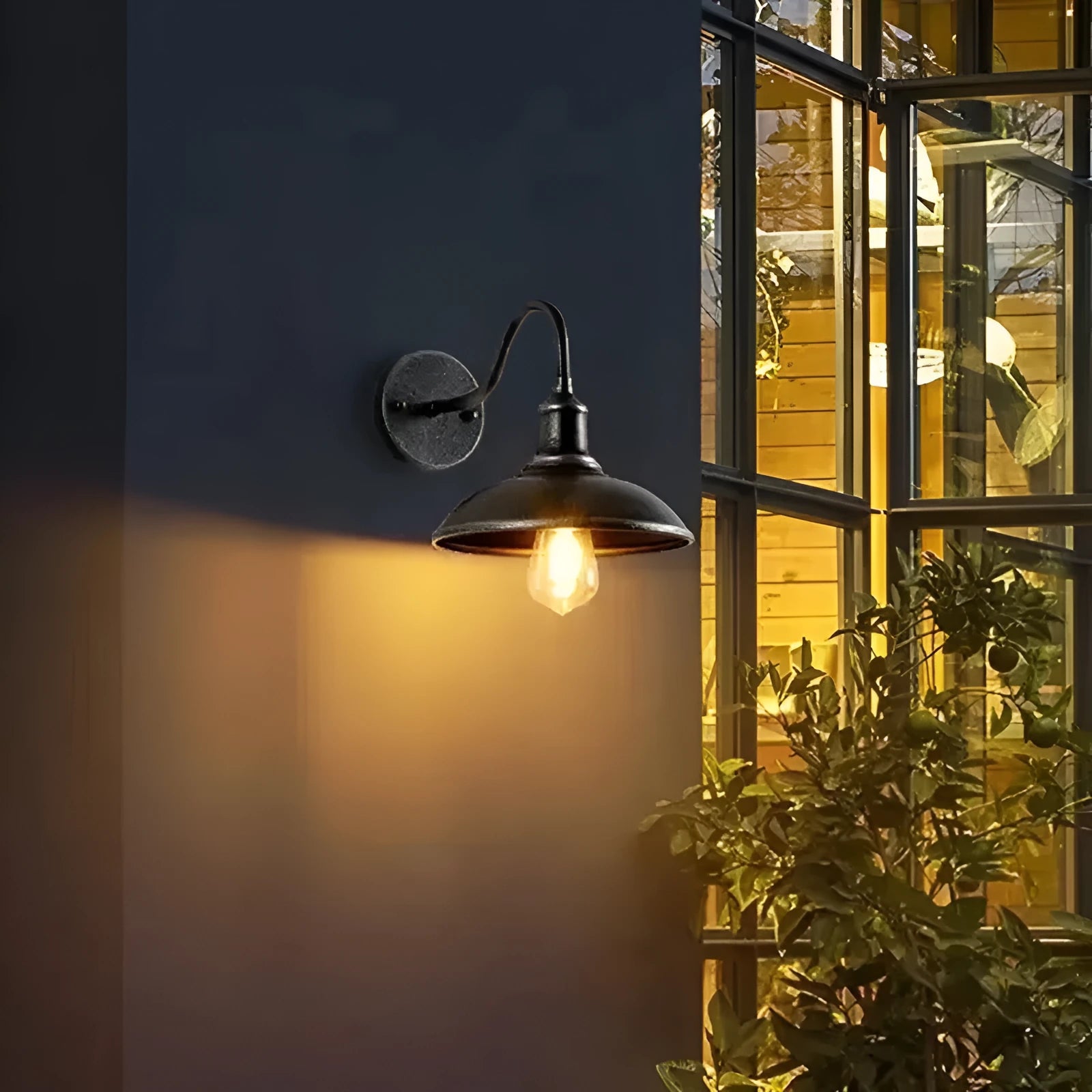 Retro-style metal wall lamp for a villa courtyard in a silver finish with right-angle mount.