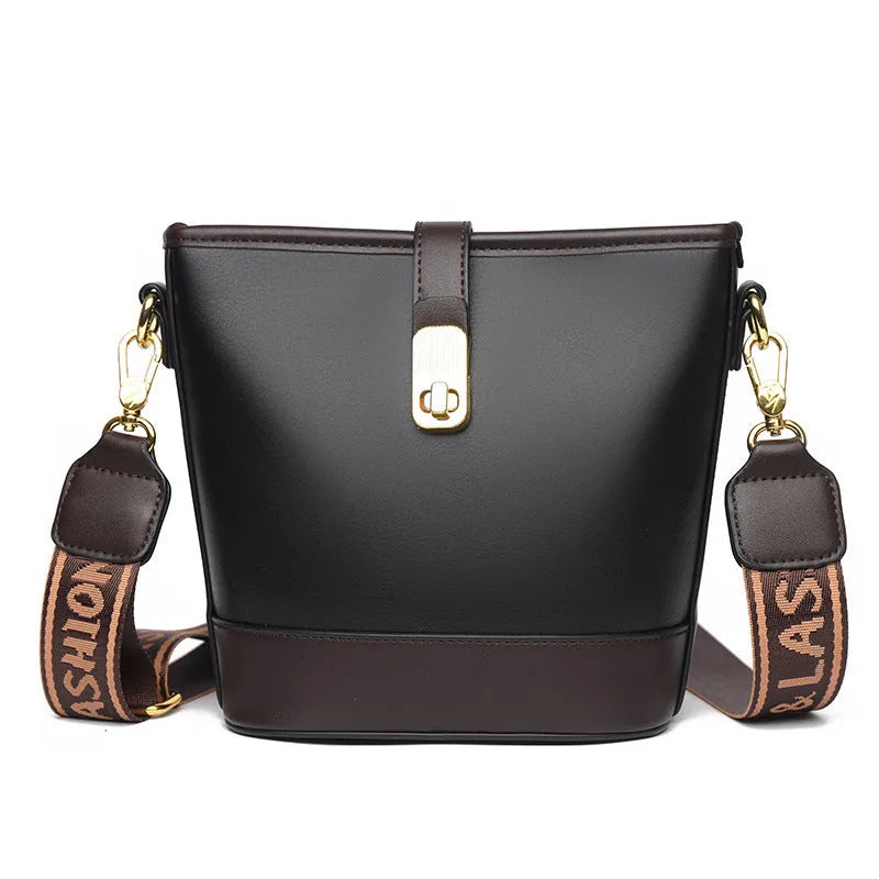 Korean style black bucket messenger bag with double shoulder straps and multiple interior compartments