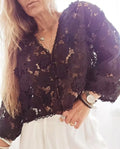 Women's loose lace cardigan with 3D floral decoration and V-neck in black, white or khaki.