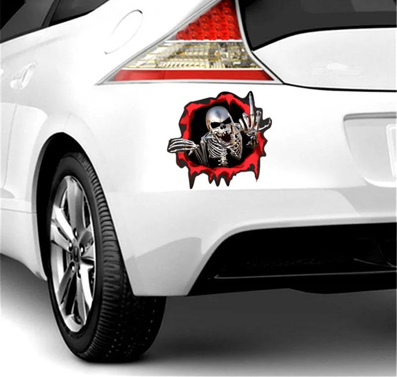 Colourful reflective metal skull bumper sticker on white background, measuring 15cm by 14cm.