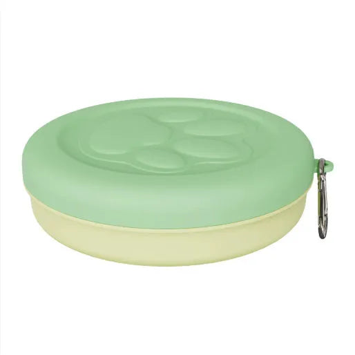 Portable dog bowl with snack box compartment in two-tone light green colour