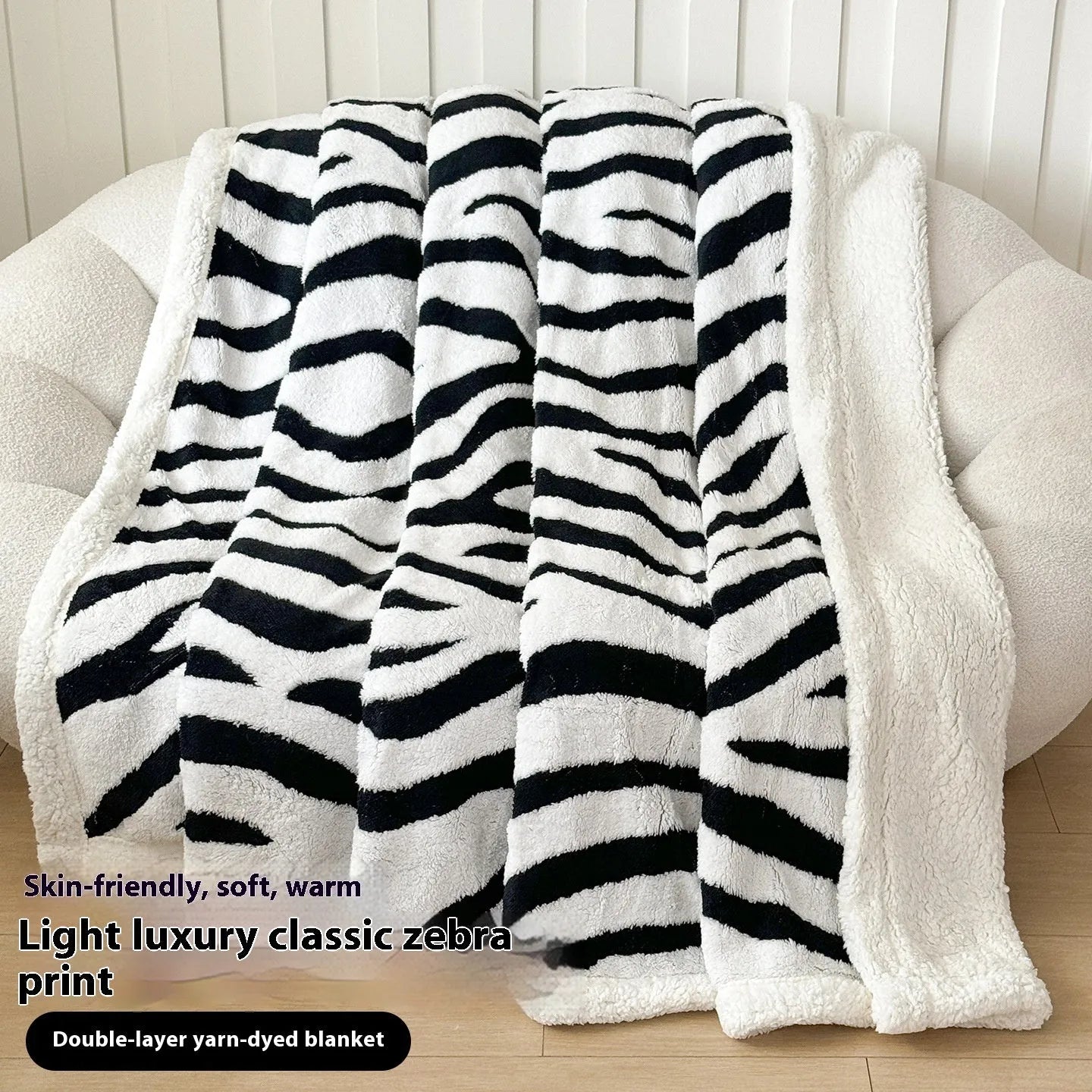 Double-layer cationic jacquard leopard print taffeta blanket in camel colour, folded to show texture.