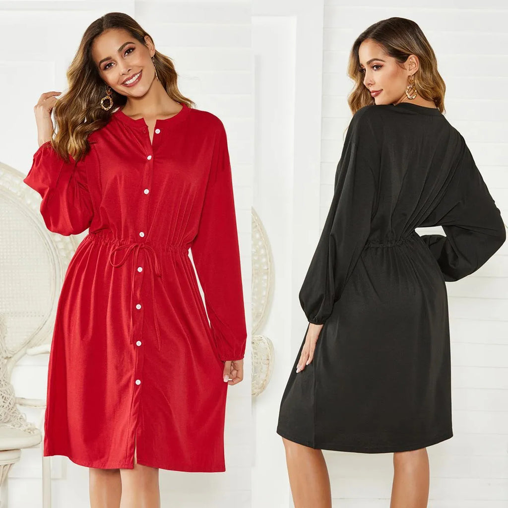 Black polyester A-line midi dress with elastic waist and long sleeves displayed front view