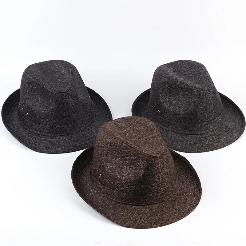 A men's brown fedora hat made from thickened suit material on a grey background.