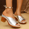 Women's beige round toe slippers with a thick chunky heel made from PU leather.