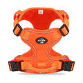 Dog hand holding rope vest harness in orange with reflective round rope and Oxford cloth construction