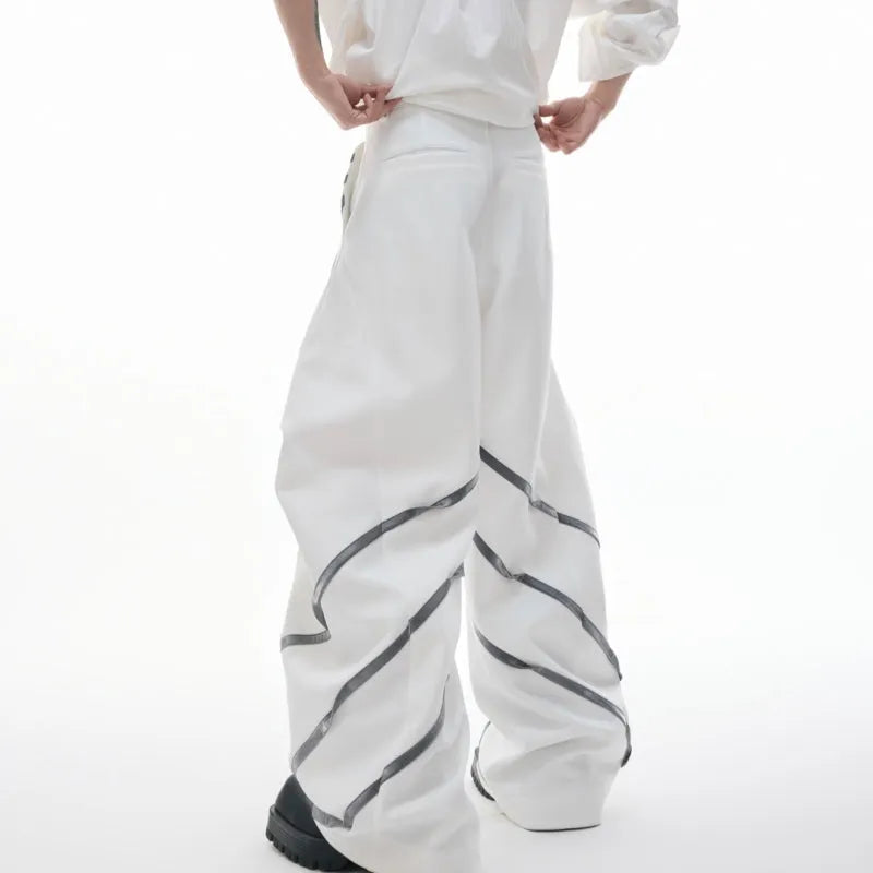Men's trousers with three-dimensional cutting and metal striped rivet pleated details