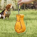 Portable 2-in-1 pet water feeder in orange with water bottle and food container compartments, shortened sling for carrying