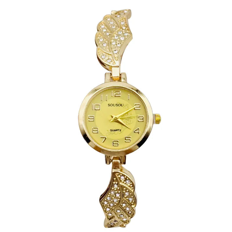 Women's stainless steel watch with round dial and Vachette clasp buckle showing gold face option