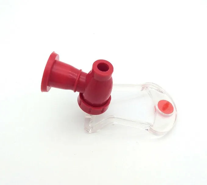 Red Magic Tap soda bottle dispenser attached to inverted 2 litre bottle with push-button mechanism