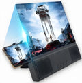 L2 mobile phone screen amplifier with 12-inch acrylic lens and Bluetooth 3.0 audio on a desk