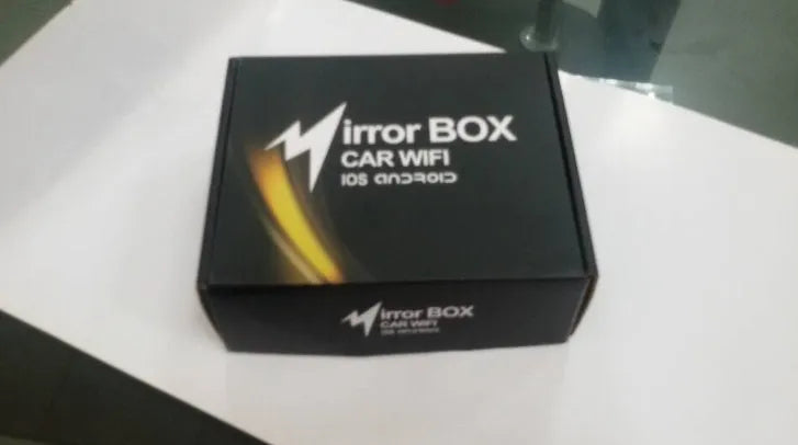 Black car Wi-Fi mirror link box converter with power cable, AV cable, antenna, and manual.