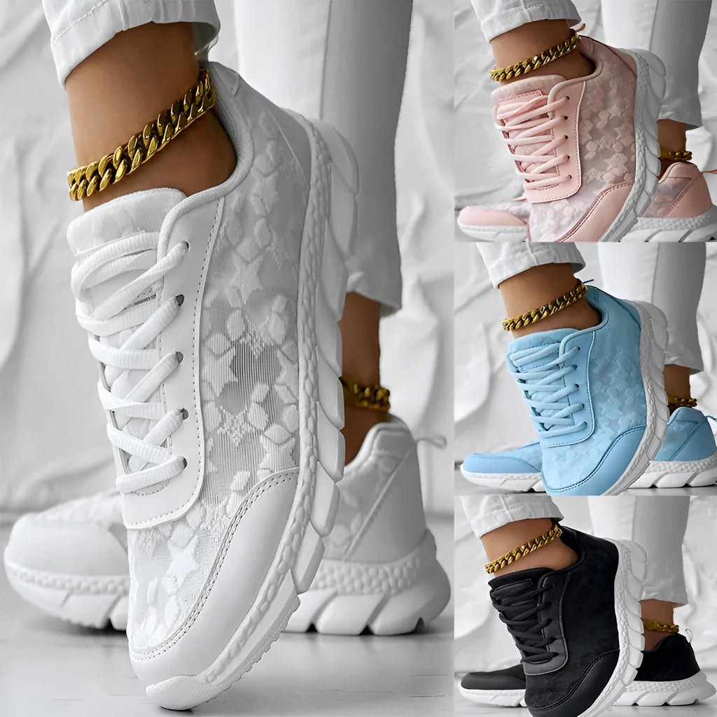 Women's casual canvas running shoes in white with a round toe, flat heel, and soft sole.