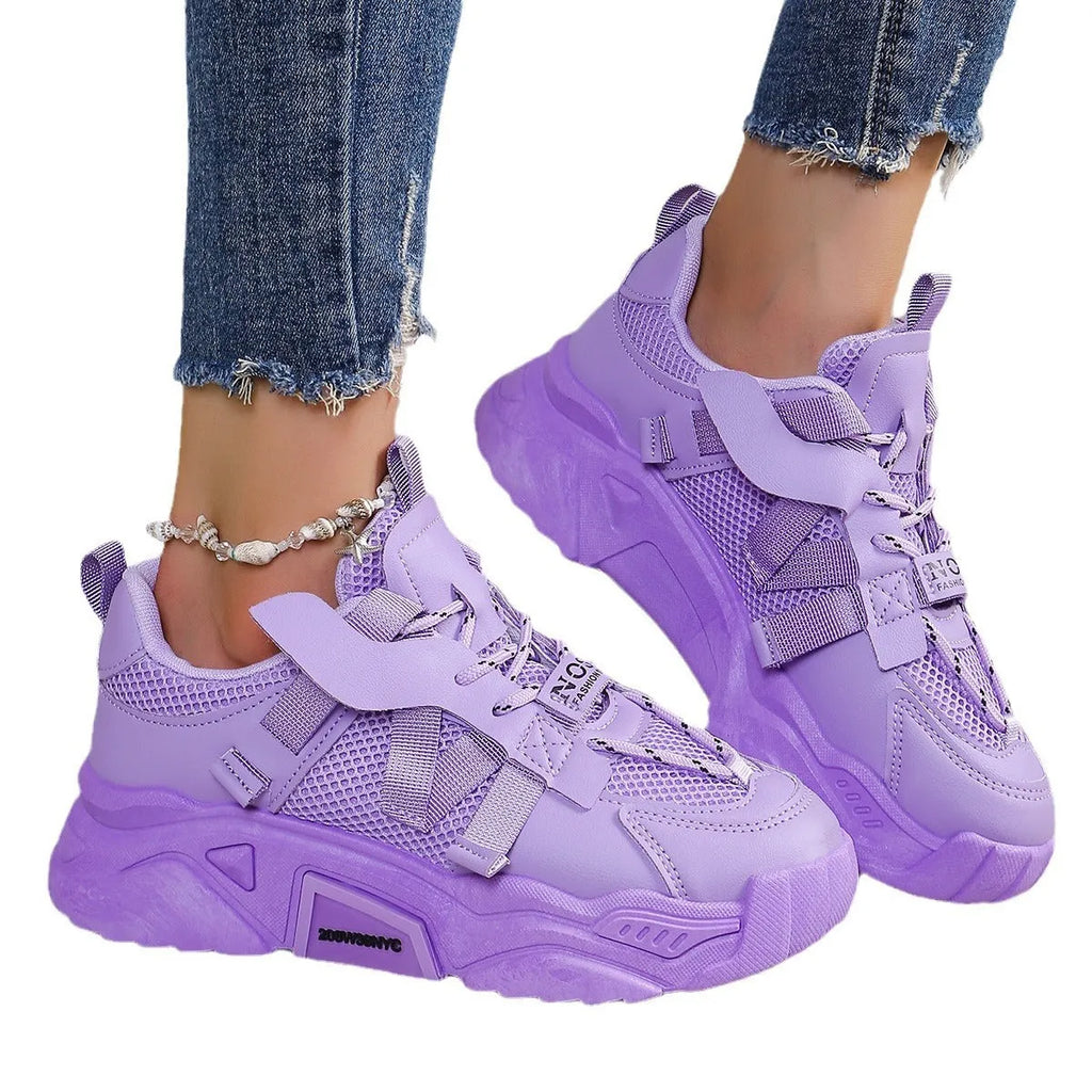 Women's purple platform mesh sports shoes with lace-up front and patterned sole