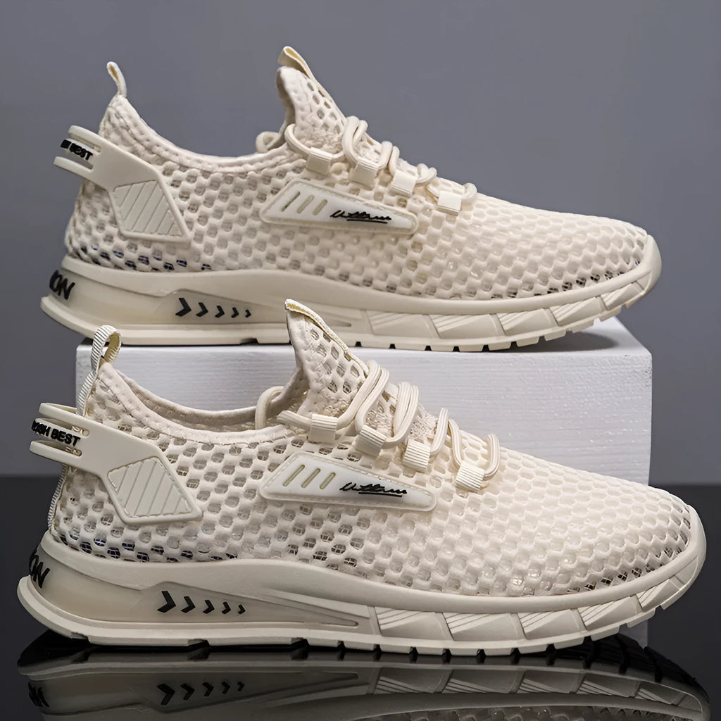 Men's beige mesh sneakers with synthetic leather upper and lace-up front on a white background