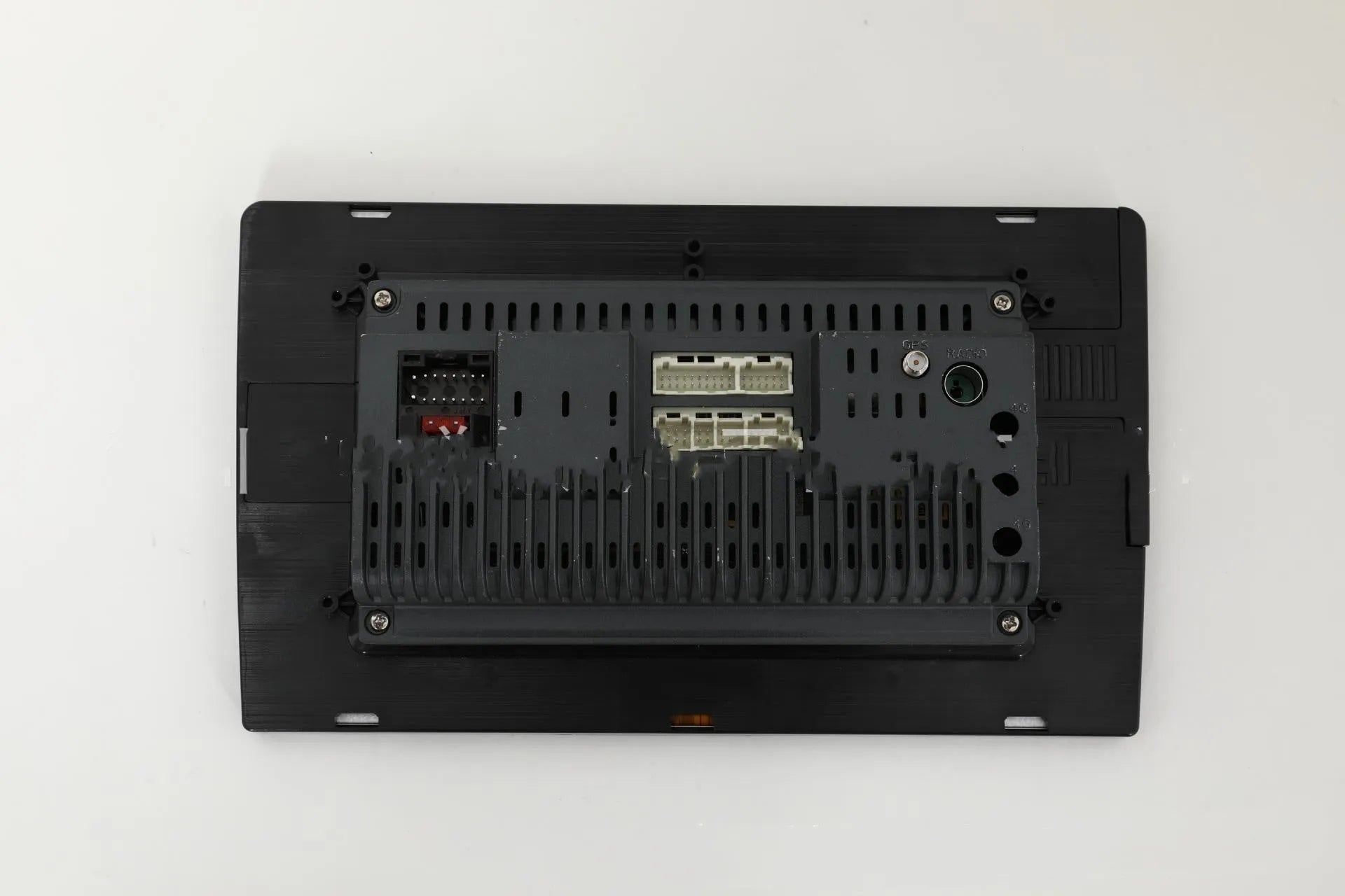 Universal Android car stereo head unit with 10.1 inch touch screen, GPS antenna, and connection cables