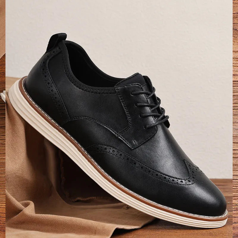Men's black and brown slip-on business casual shoes with round toe and sculptured detailing