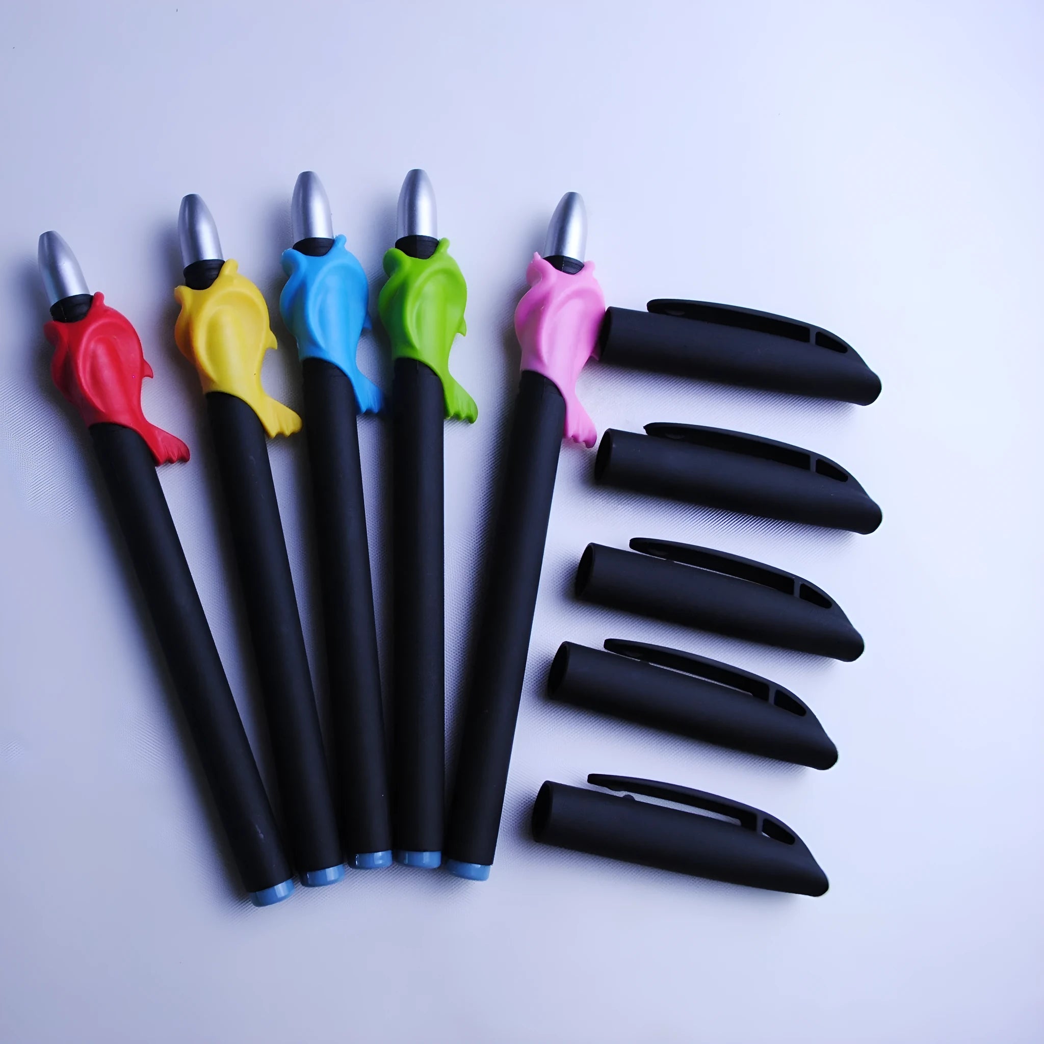 Blue automatic fading pen set with 0.5mm tip, eight refills, and plastic holder on white background