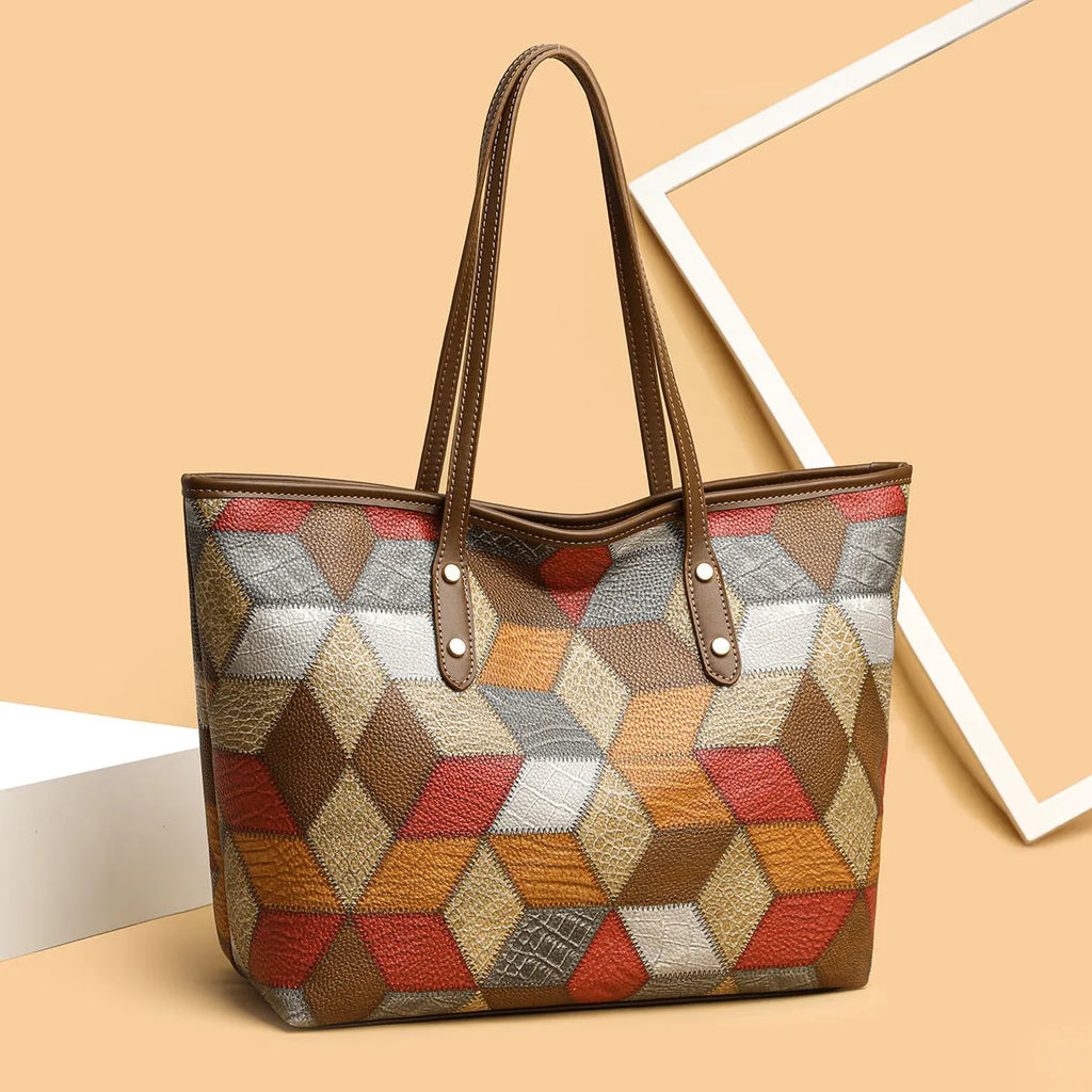 Women's blue brown PVC shoulder handbag with sandwich pocket design showing organised compartments