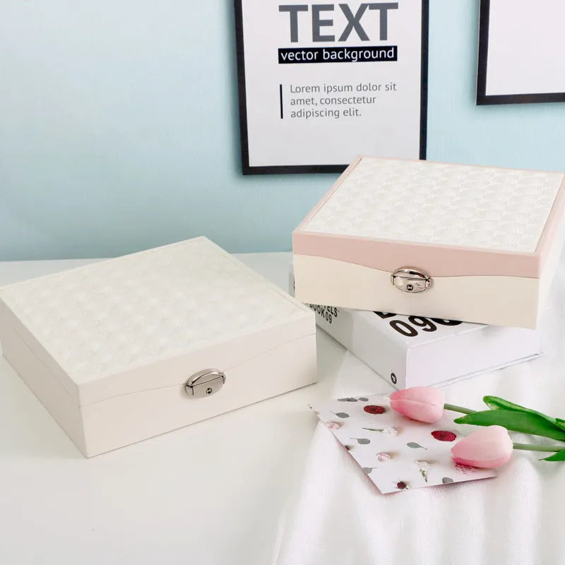 Red PU leather jewellery storage box with large capacity for rings and necklaces.